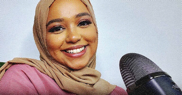 Close up photo of Amina Aweis, smiling. 