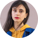 Avatar of Tess Guttuso in a bright jacket